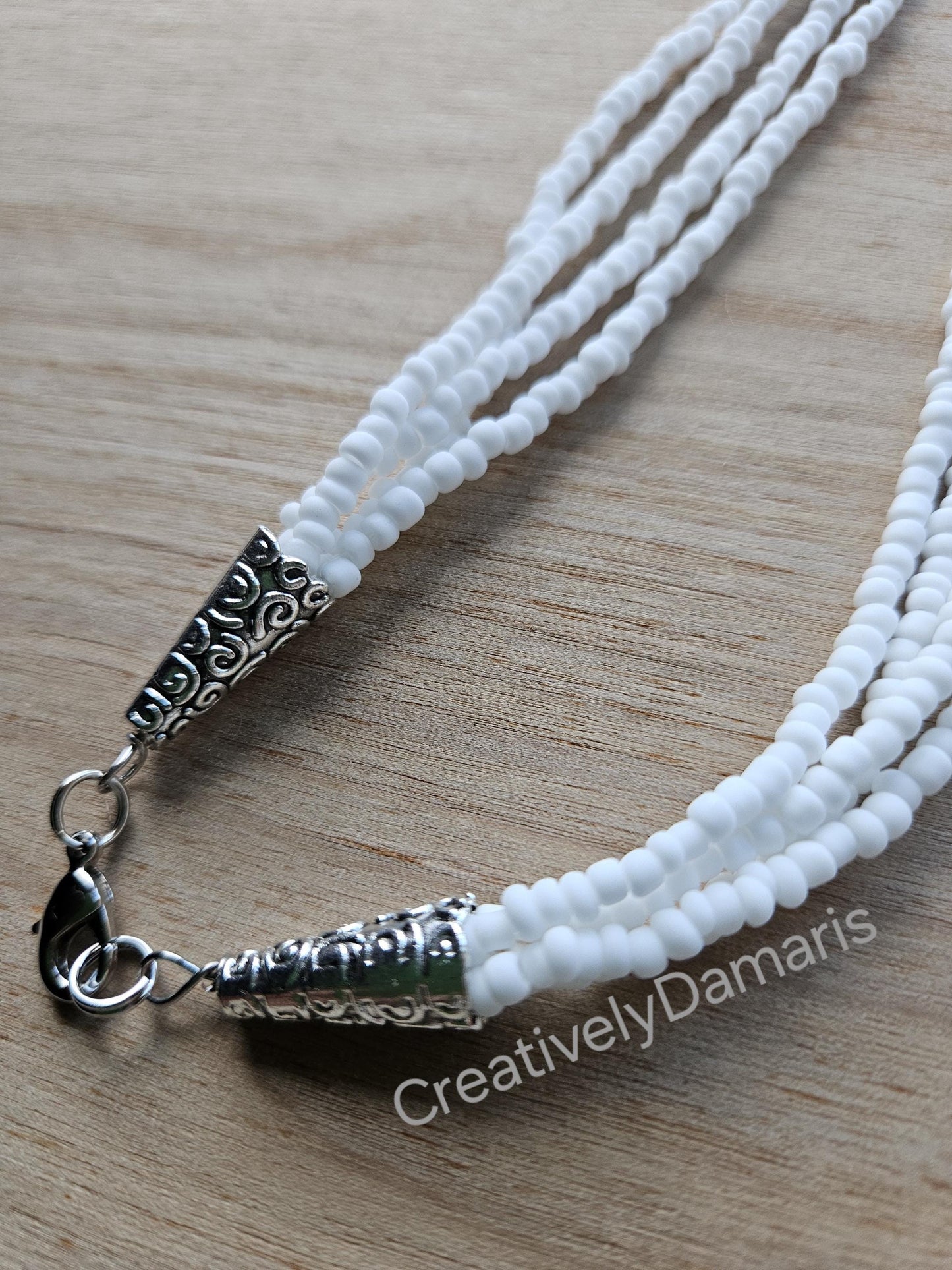 White Matte Seed Beaded Knotted Multi Strand Necklace