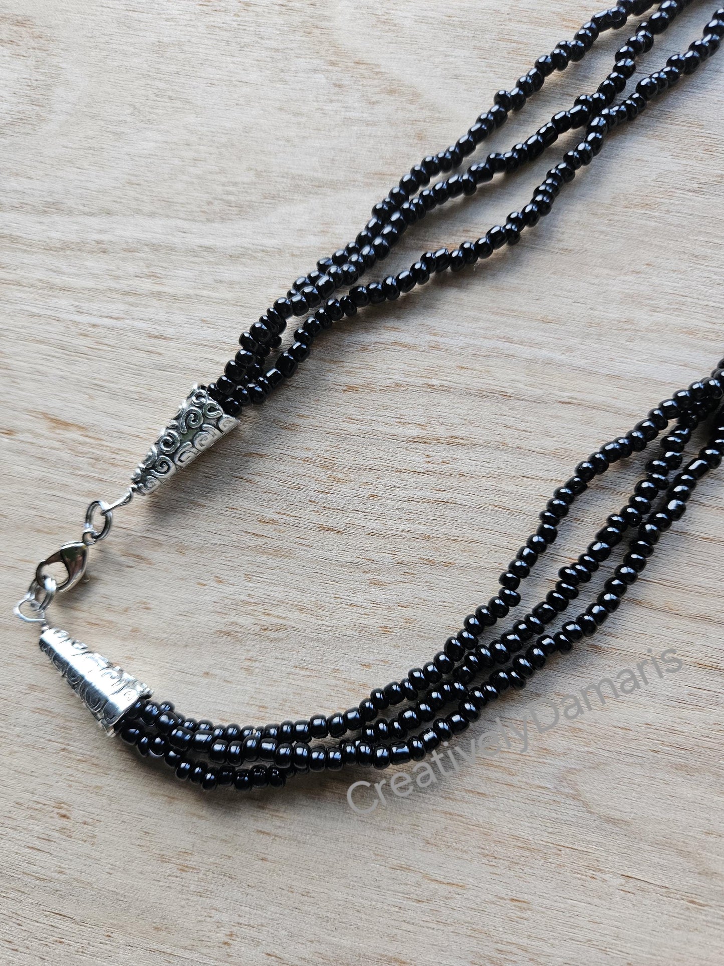 Black Seeds Beaded Multi Strand knotted Necklace